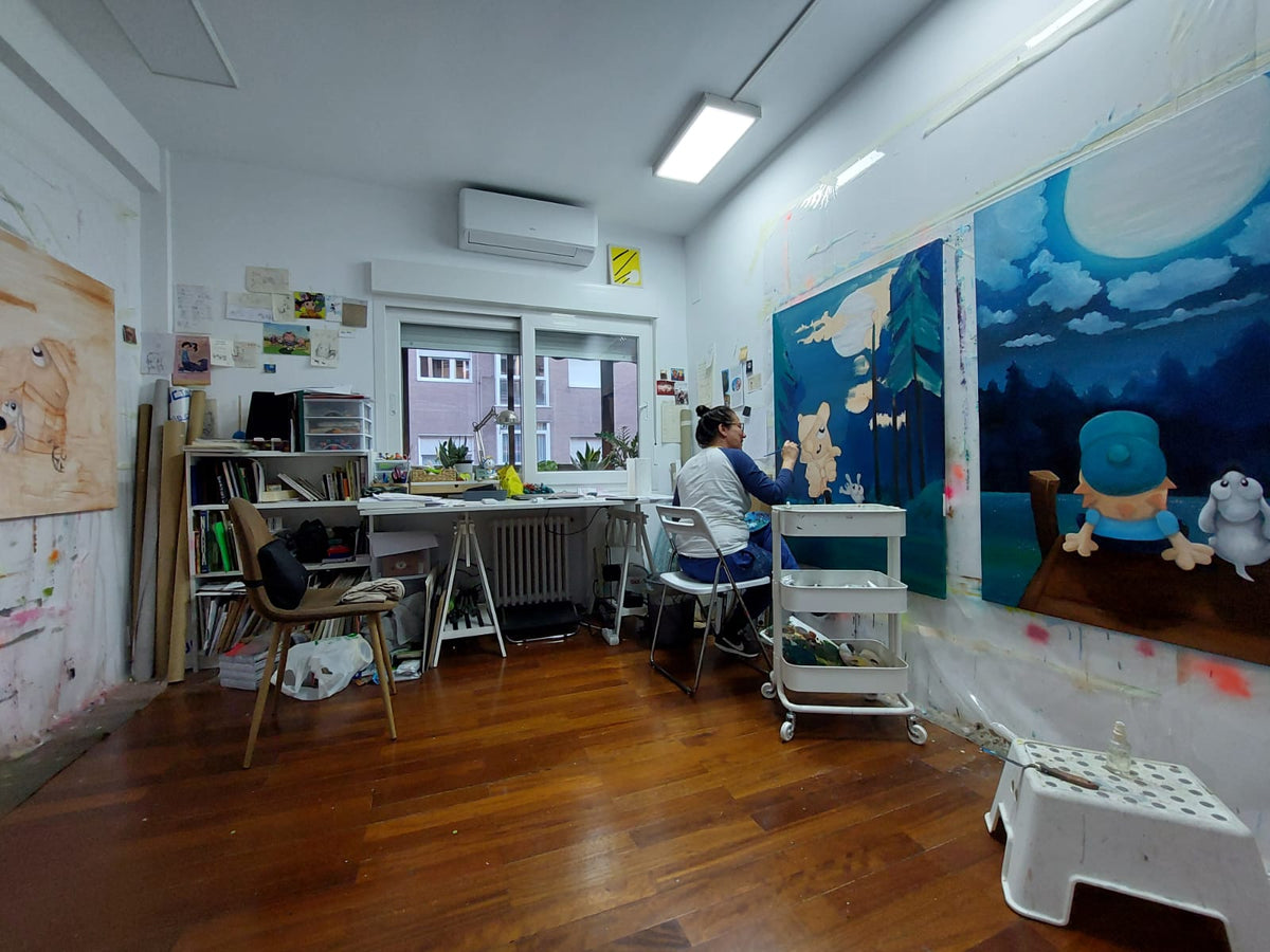 Debbie Reda painting in her studio