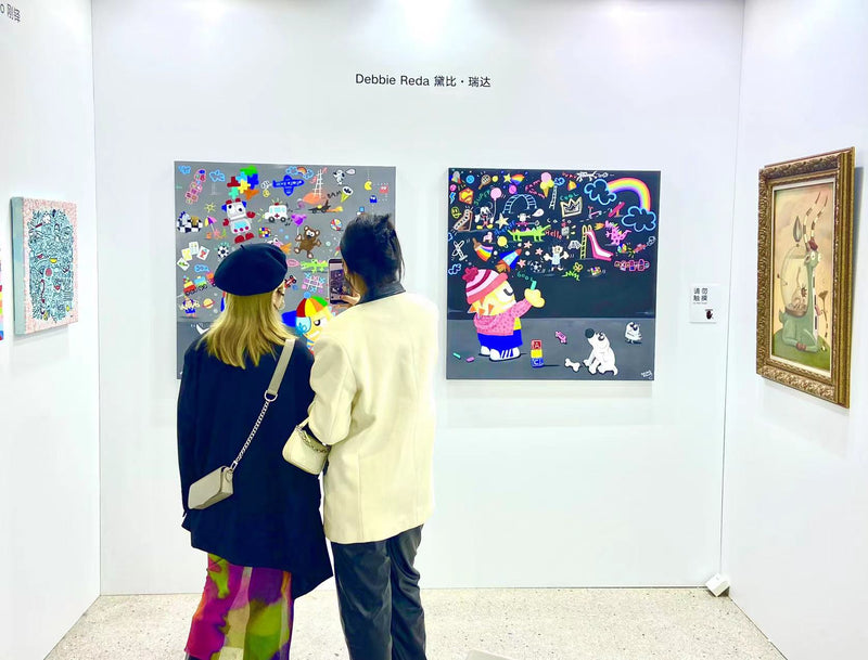 Visitors at a Debbie Reda exhibition 1